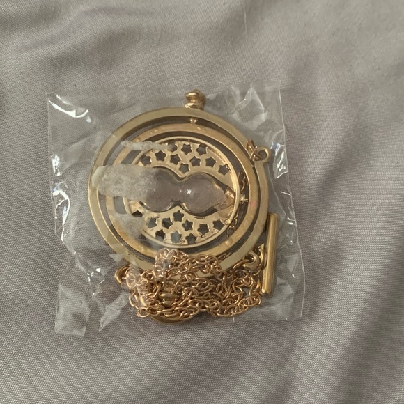 NWOT Harry Potter Time Turner Swiveling Hourglass Rotating Time Necklace Gold - Picture 3 of 10